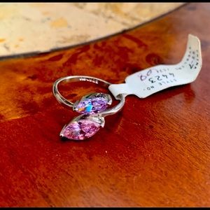 Pretty, feminine new sterling silver ring with pink and lavender CZ gemstones.